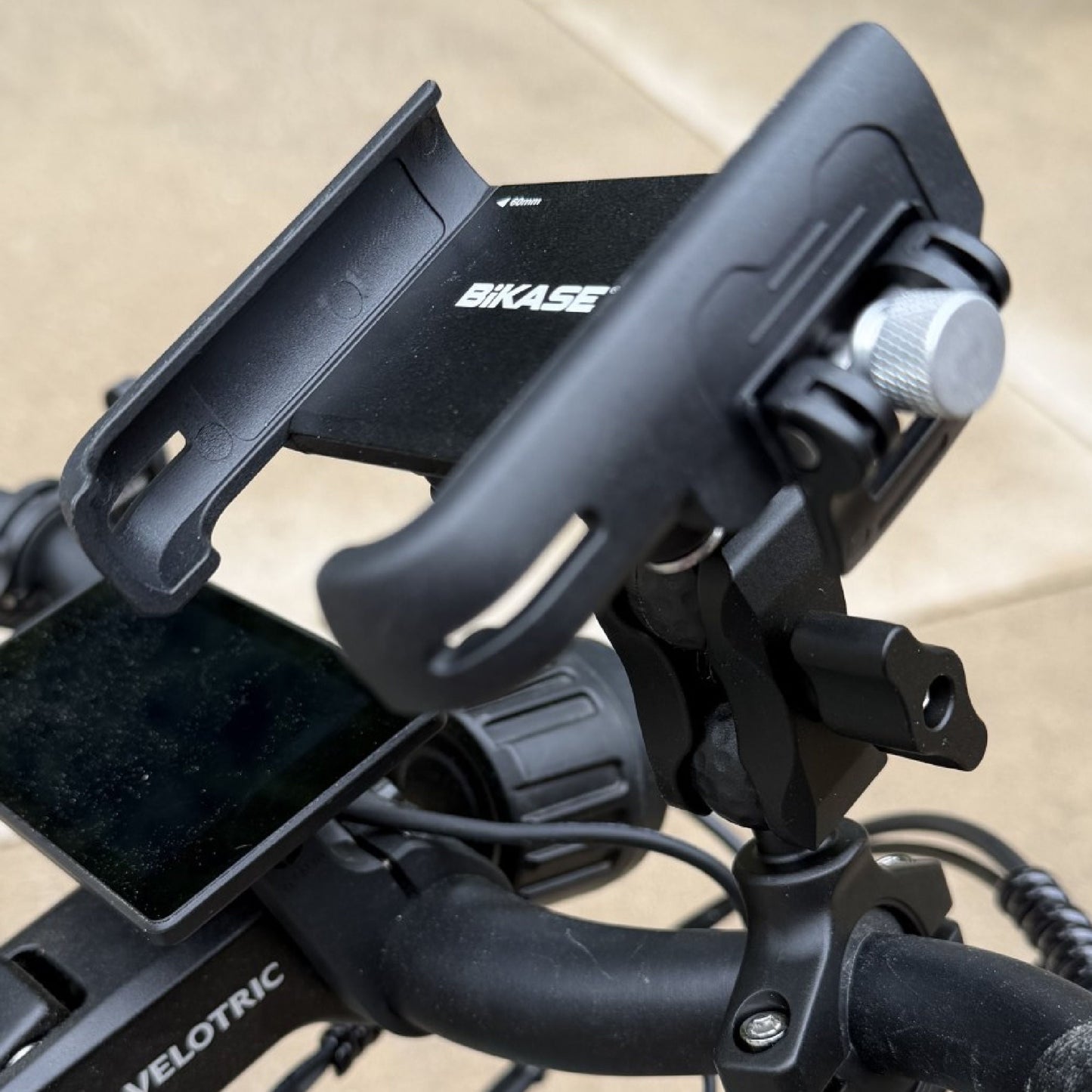 IsoKASE phone holder with the included light holder attachment