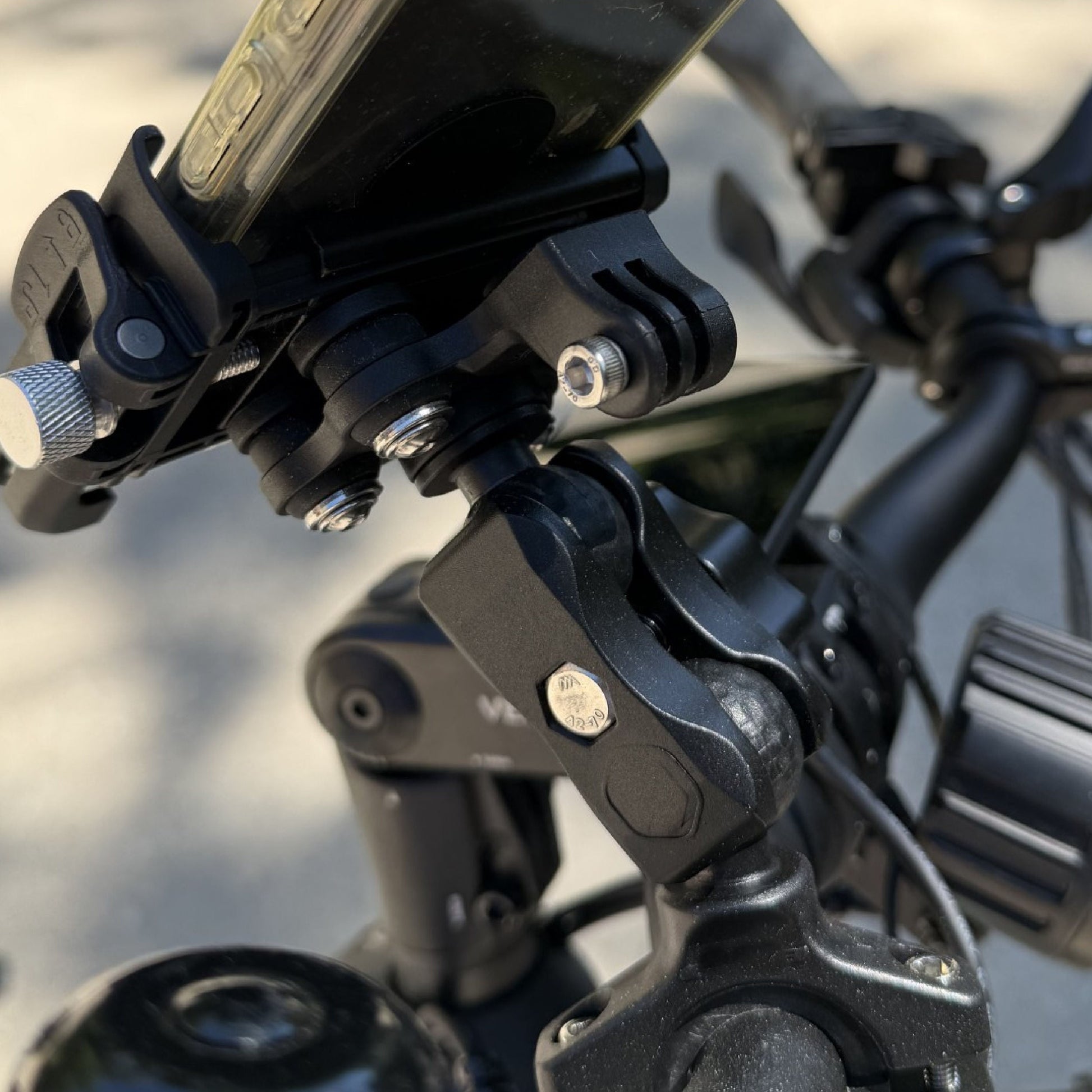 IsoKASE phone holder showing the double ball joint adjustment